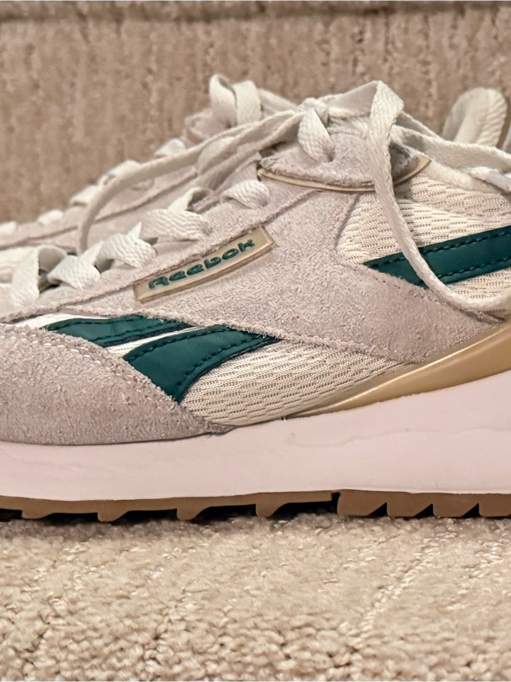 Reebok Women's Sneakers in Off-White with Teal Accents